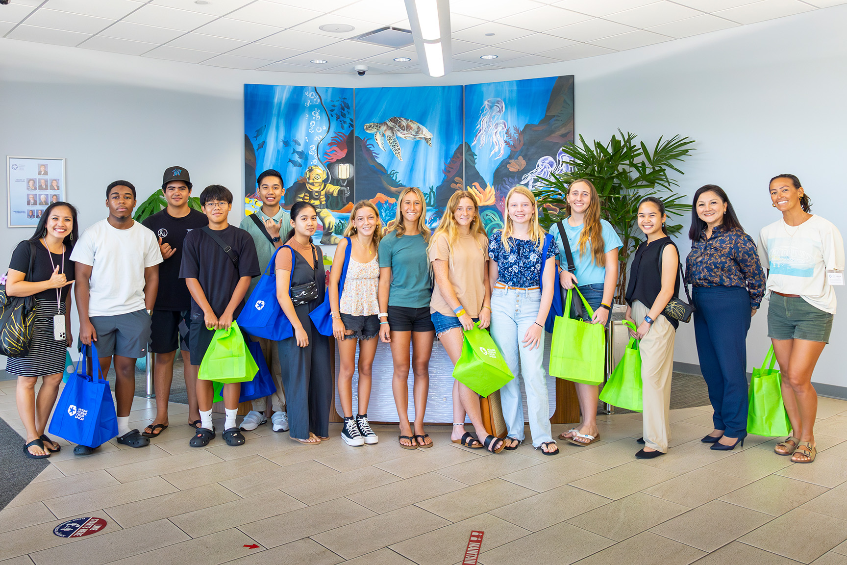 Group shot of GLOW students and Hickam FCU staff